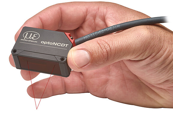 optoNCDT laser sensor held by a hand